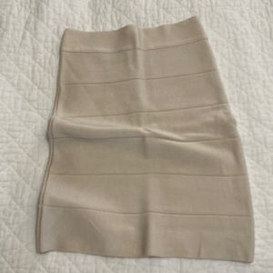 Bebe champagne color high waisted skirt. Size small.